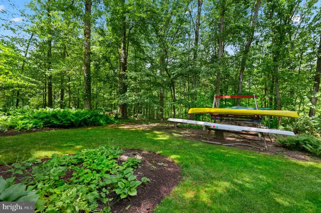 a house with trees in the background