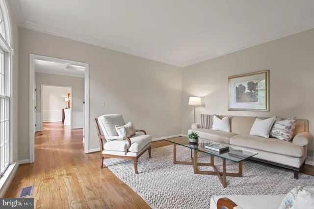 a view of entryway with wooden floor and a potted plant