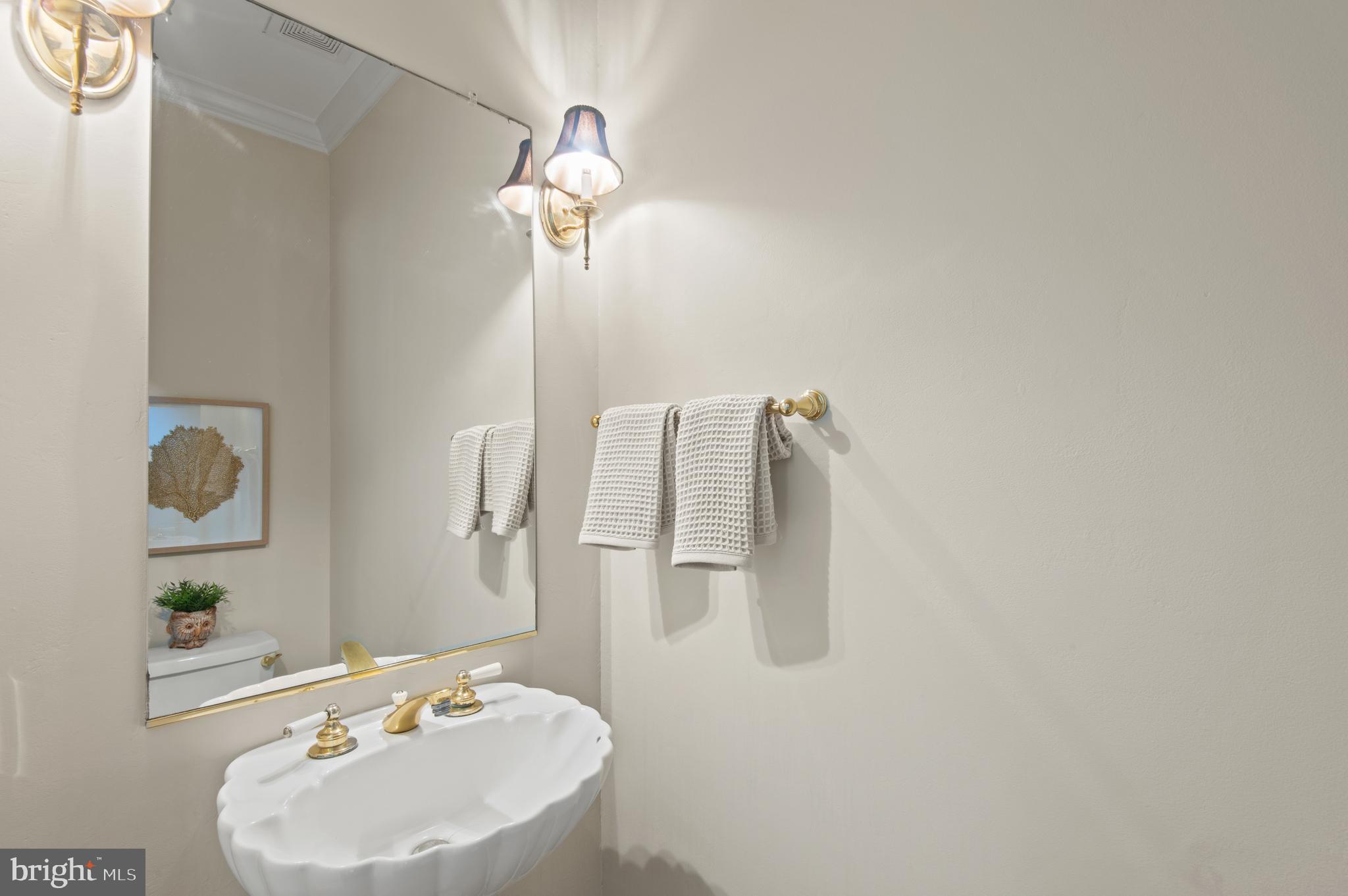 8 Henderson Hill Court Monkton, MD 21111 - Photo 10 of 55 a bathroom with a sink and mirror