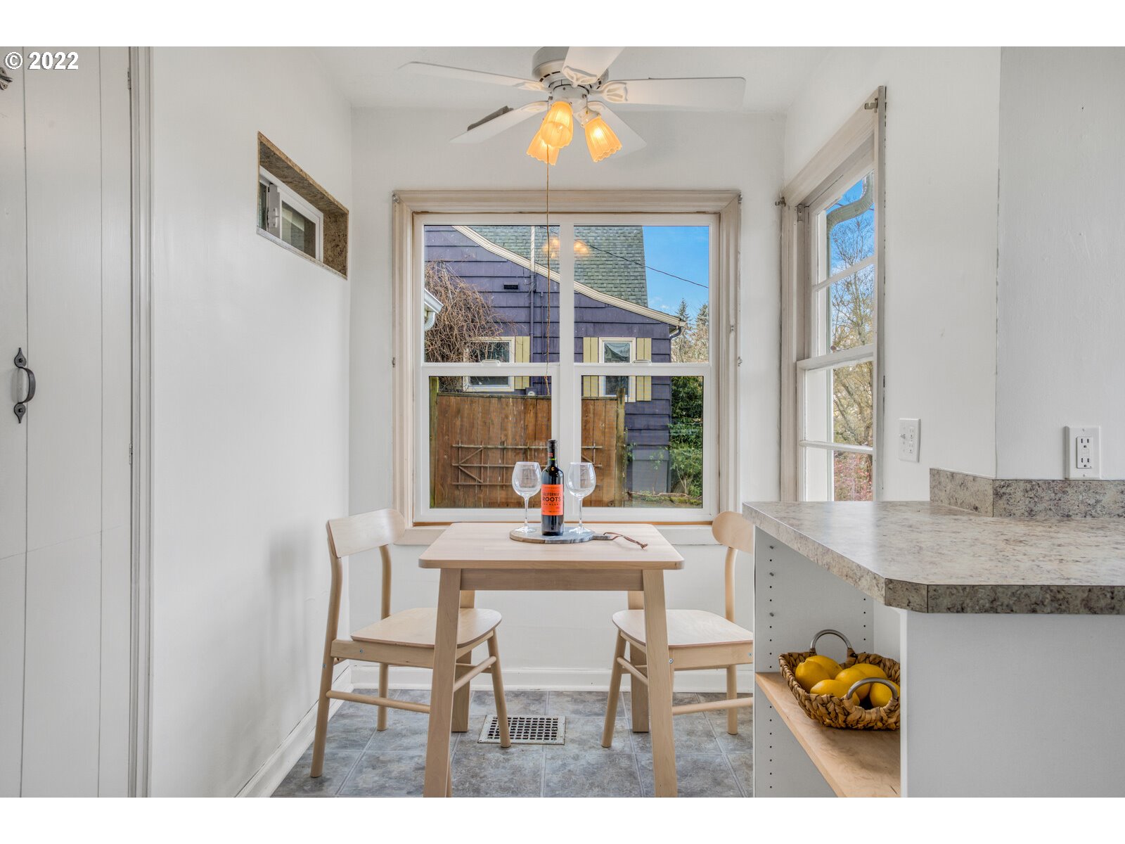 3330 Southwest Primrose Street Portland, OR 97219 - Photo 10 of 26 a dining room with furniture and window