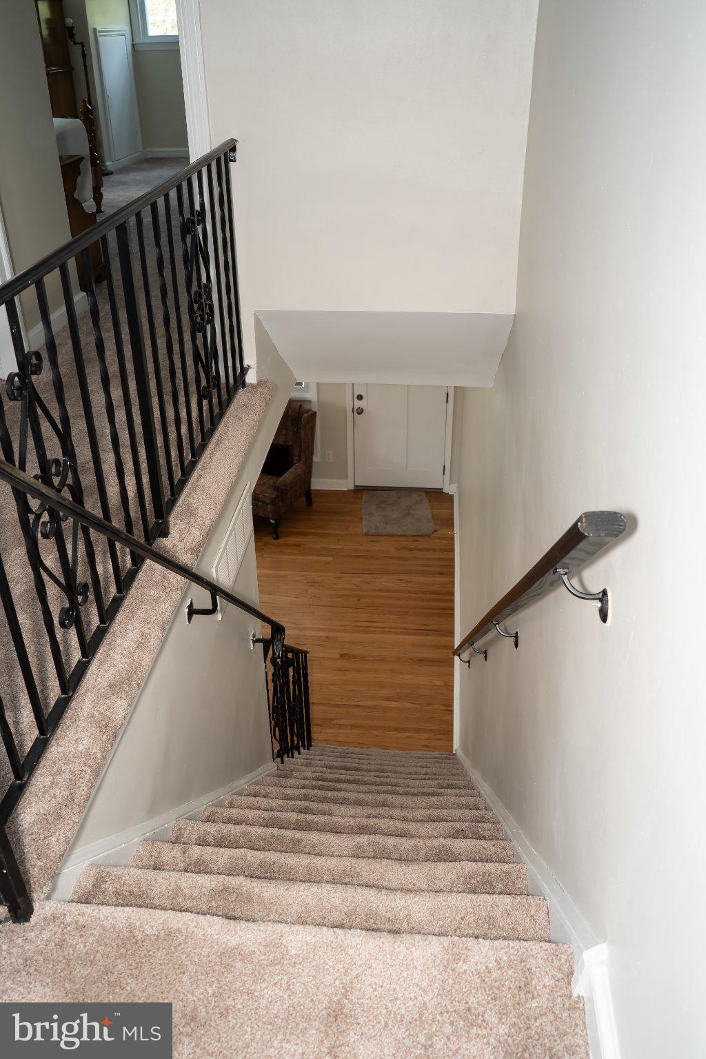 753 East 25th Street Chester, PA 19013 - Photo 14 of 47 Inviting staircase to a warm entryway.