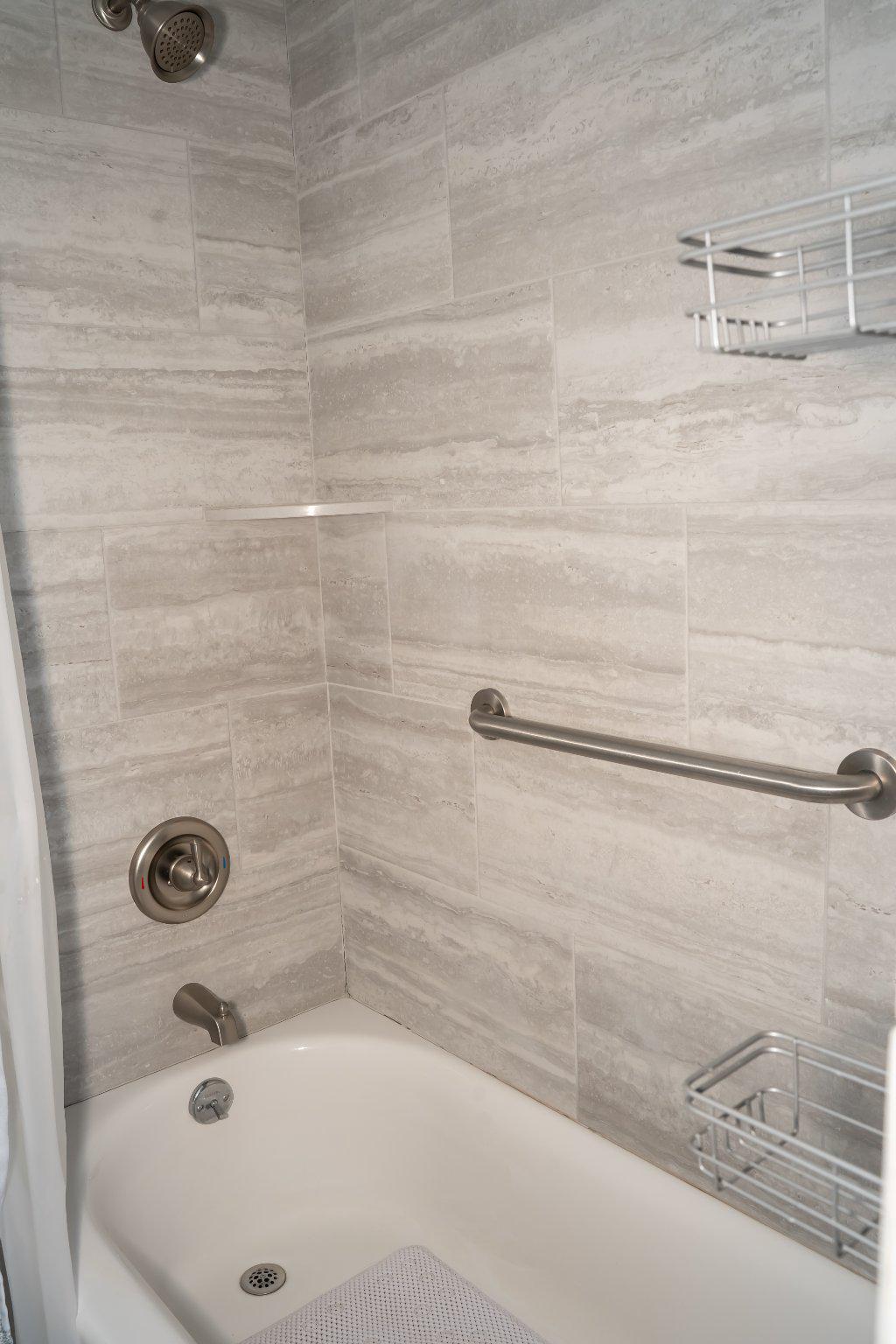 753 East 25th Street Chester, PA 19013 - Photo 20 of 47 Tile bathroom with pretty fixtures.