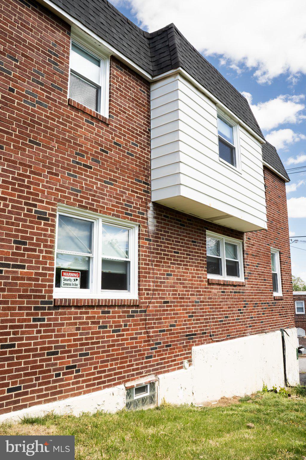 753 East 25th Street Chester, PA 19013 - Photo 3 of 47 Charming brick exterior with modern accents.