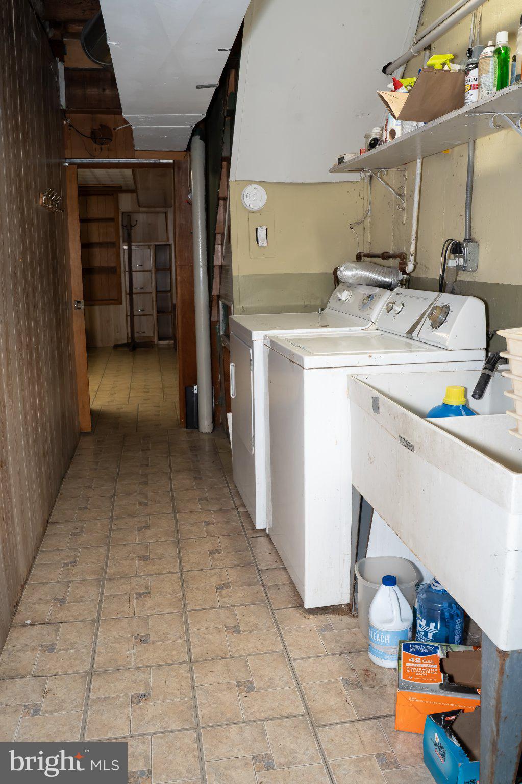 753 East 25th Street Chester, PA 19013 - Photo 39 of 47 Functional laundry space with storage.