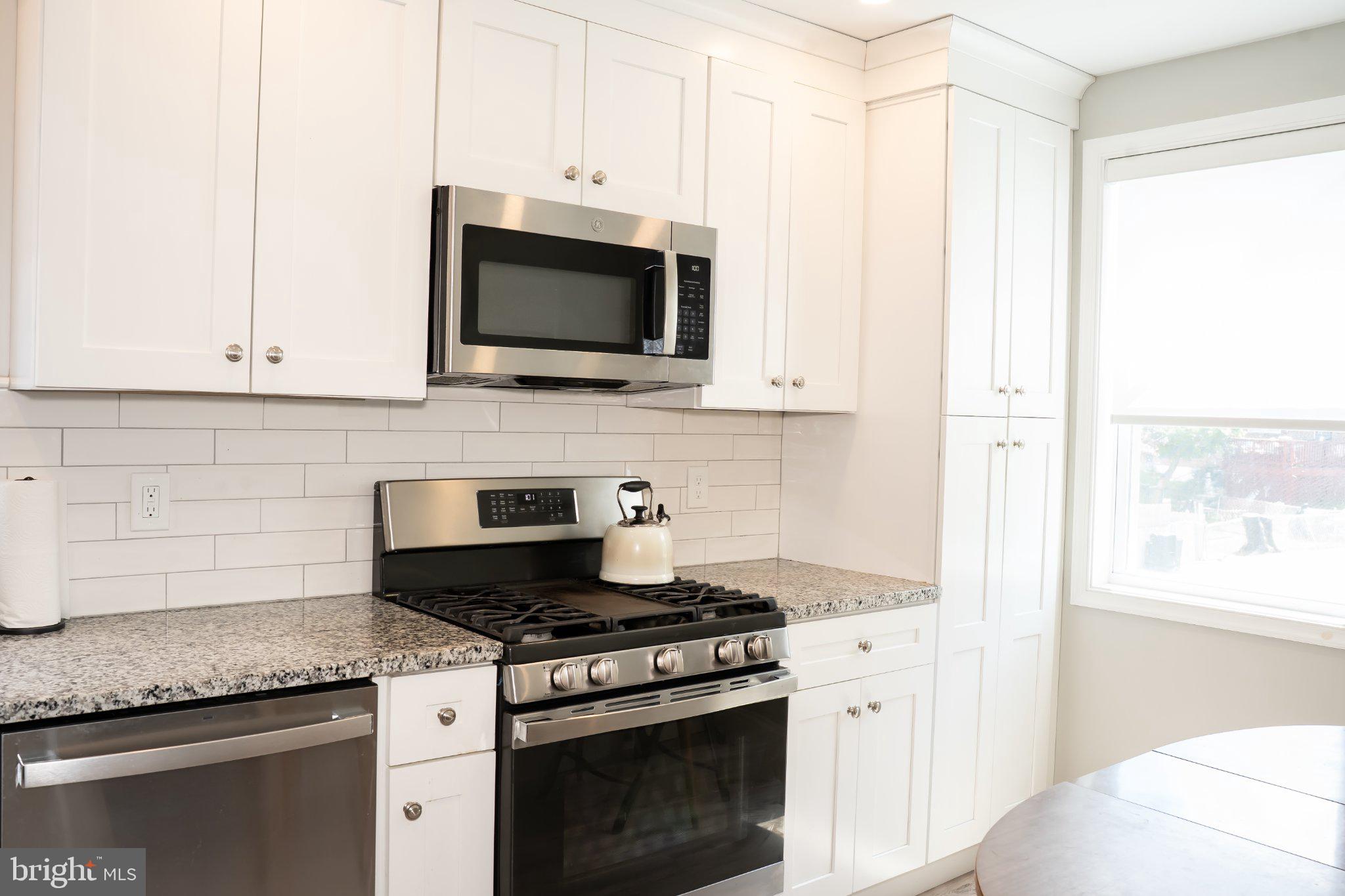 753 East 25th Street Chester, PA 19013 - Photo 5 of 47 Modern kitchen with sleek finishes.