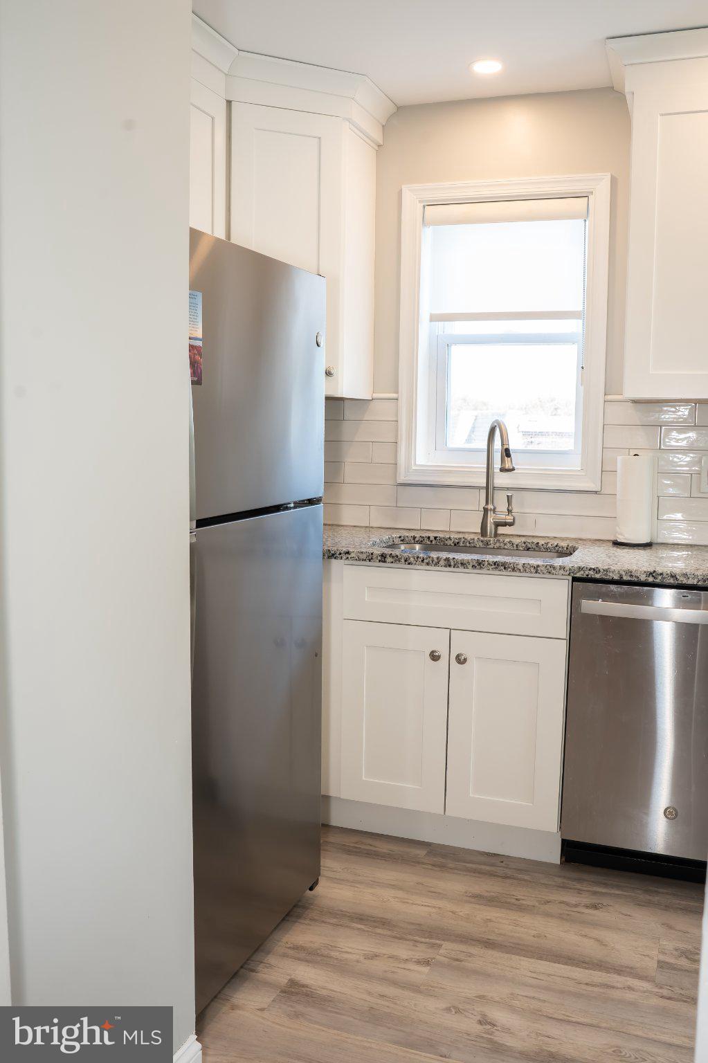 753 East 25th Street Chester, PA 19013 - Photo 7 of 47 Modern kitchen with sleek finishes.