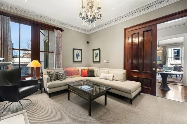 a bedroom with a bed and a fireplace