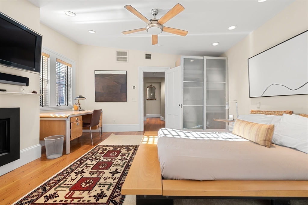 54 Union Park Boston, MA 02116 - Photo 23 of 35 a living room with a couch and a flat screen tv