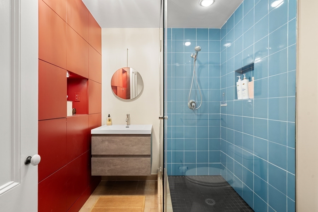 54 Union Park Boston, MA 02116 - Photo 27 of 35 a bathroom with a sink and a shower