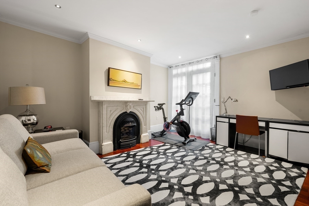 54 Union Park Boston, MA 02116 - Photo 28 of 35 a bedroom with bed and a flat screen tv