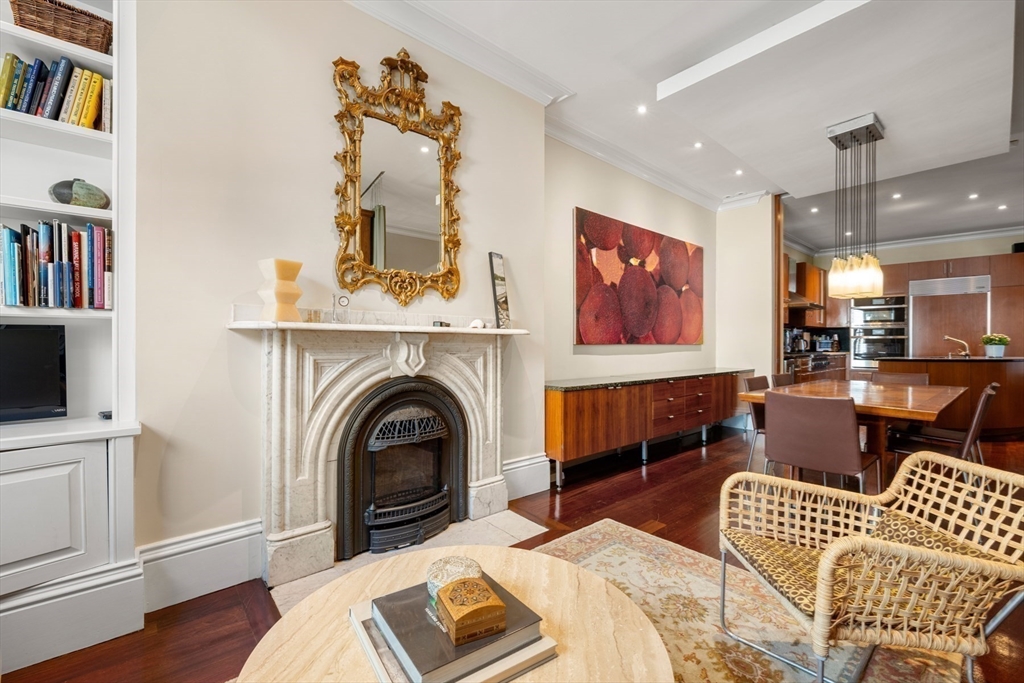 54 Union Park Boston, MA 02116 - Photo 6 of 35 a living room with furniture and a fireplace