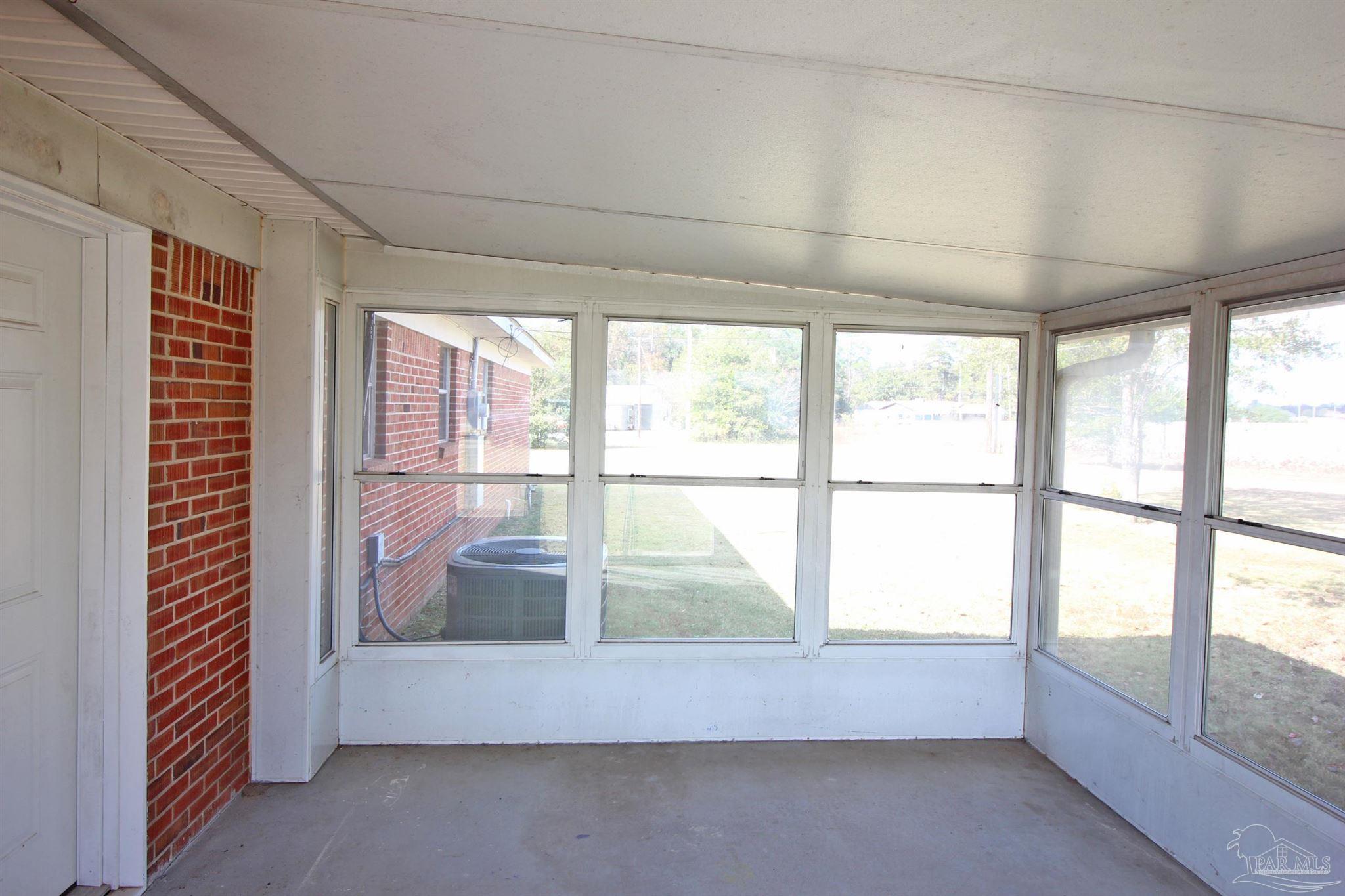 141 Holt Street Flomaton, AL 36441 - Photo 27 of 28 a view of an empty room with a window