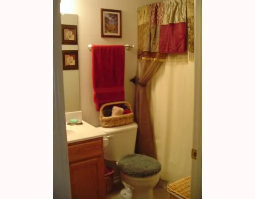 a bathroom with a sink and toilet