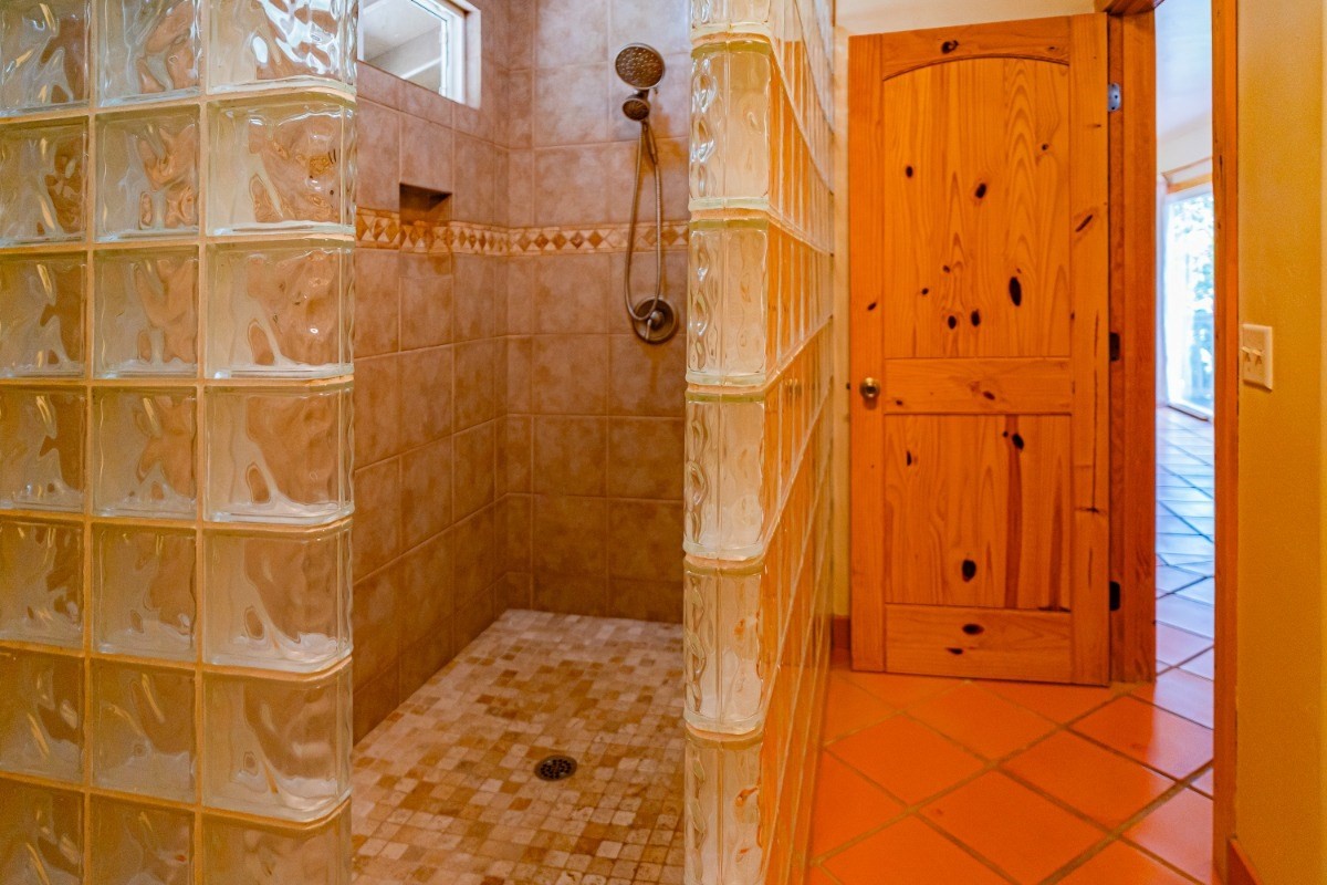 2435 Waipuna Road, Unit 12 Lihue, HI 96766 - Photo 13 of 27 a bathroom with a shower