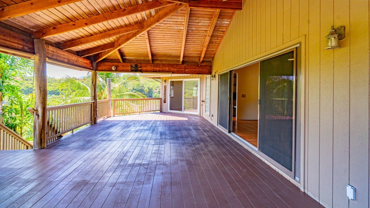2435 Waipuna Road, Unit 12 Lihue, HI 96766 - Photo 21 of 27 a view of porch with wooden floor and furniture