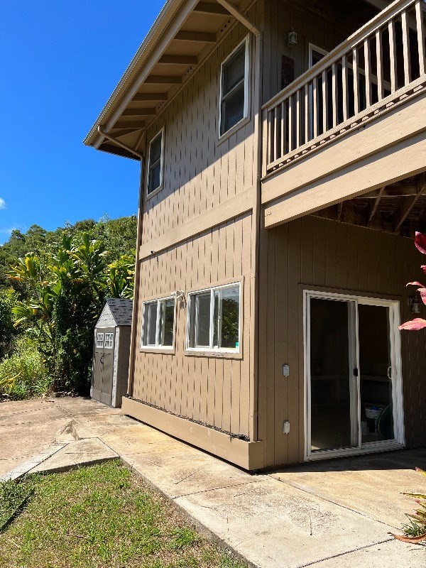 2435 Waipuna Road, Unit 12 Lihue, HI 96766 - Photo 26 of 27 a view of a house with a backyard