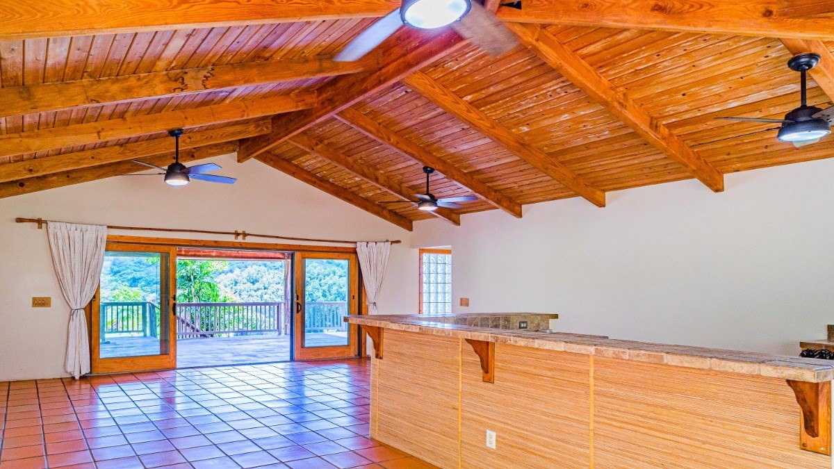 2435 Waipuna Road, Unit 12 Lihue, HI 96766 - Photo 8 of 27 a view of a room with wooden floor