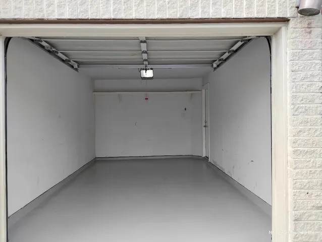 a view of backyard with green space