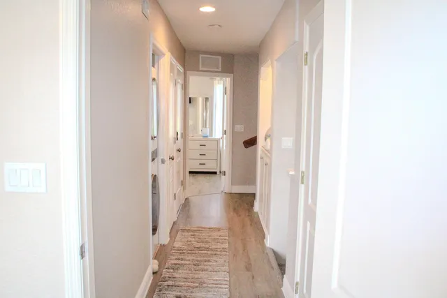 a kitchen with stainless steel appliances granite countertop a sink stove and microwave
