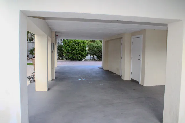a front view of a house with a garage