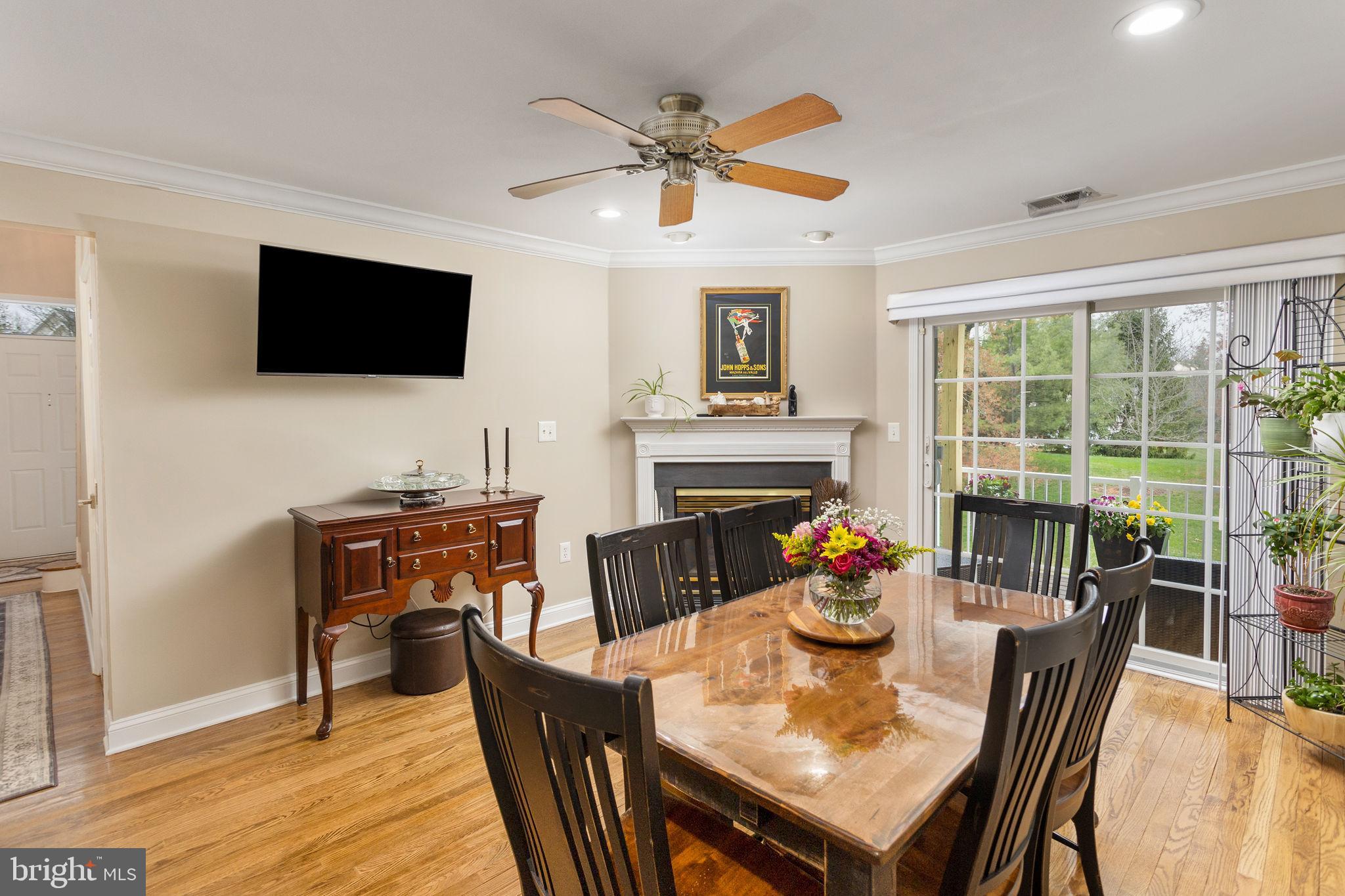 243 Colt Street Pennington, NJ 08534 - Photo 14 of 46 a dining room with furniture window and wooden floor