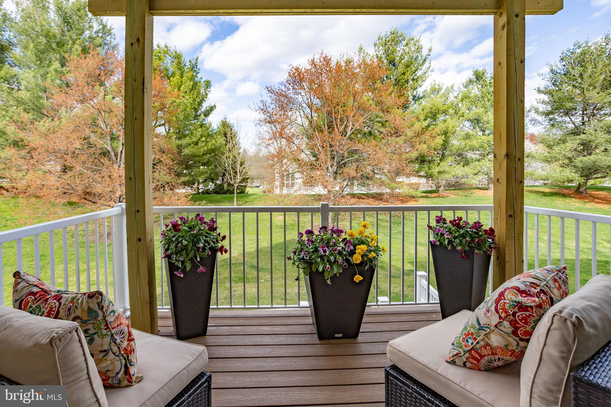 243 Colt Street Pennington, NJ 08534 - Photo 15 of 46 a view of a porch with furniture