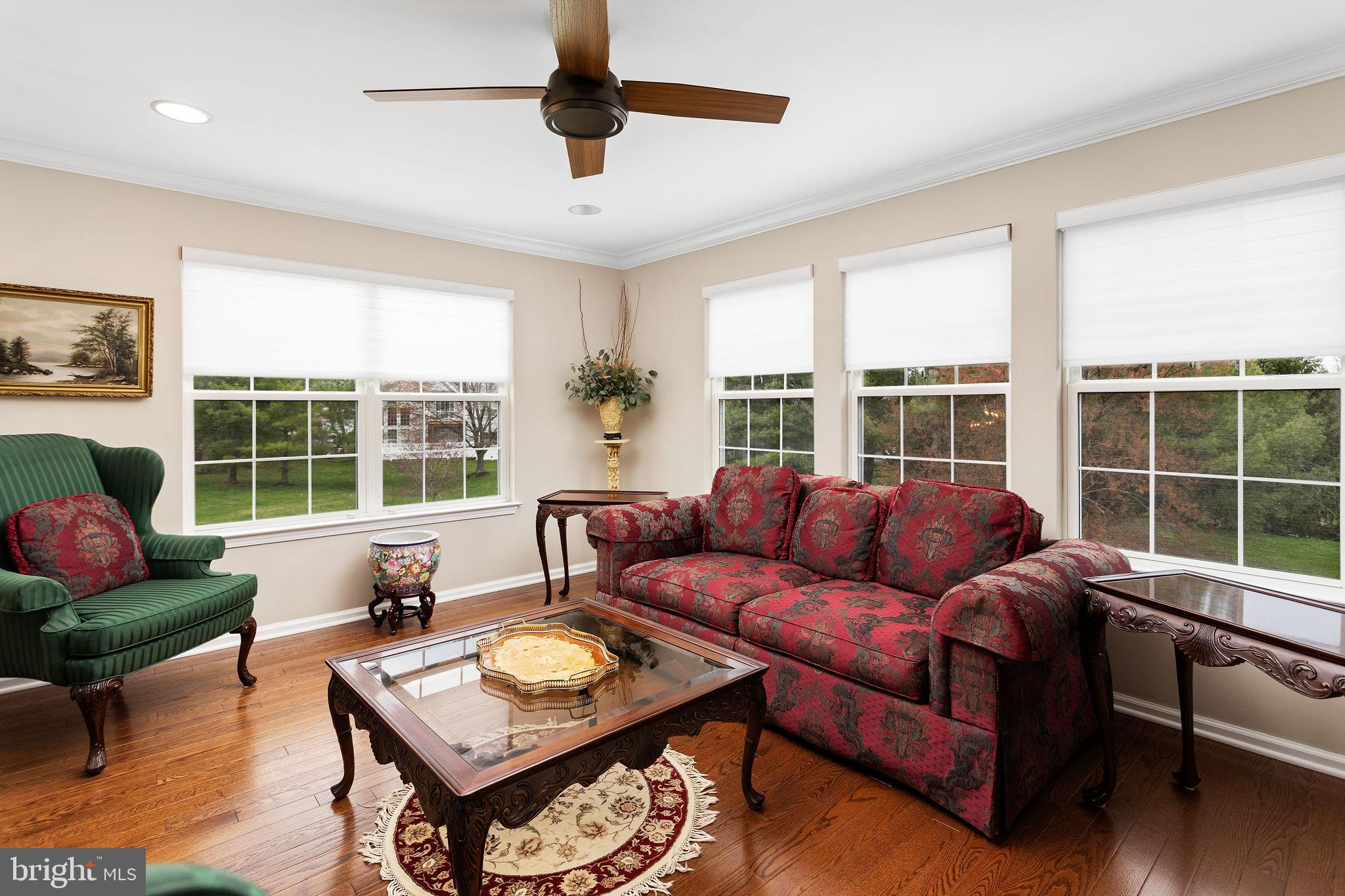 243 Colt Street Pennington, NJ 08534 - Photo 27 of 46 a living room with furniture and a large window