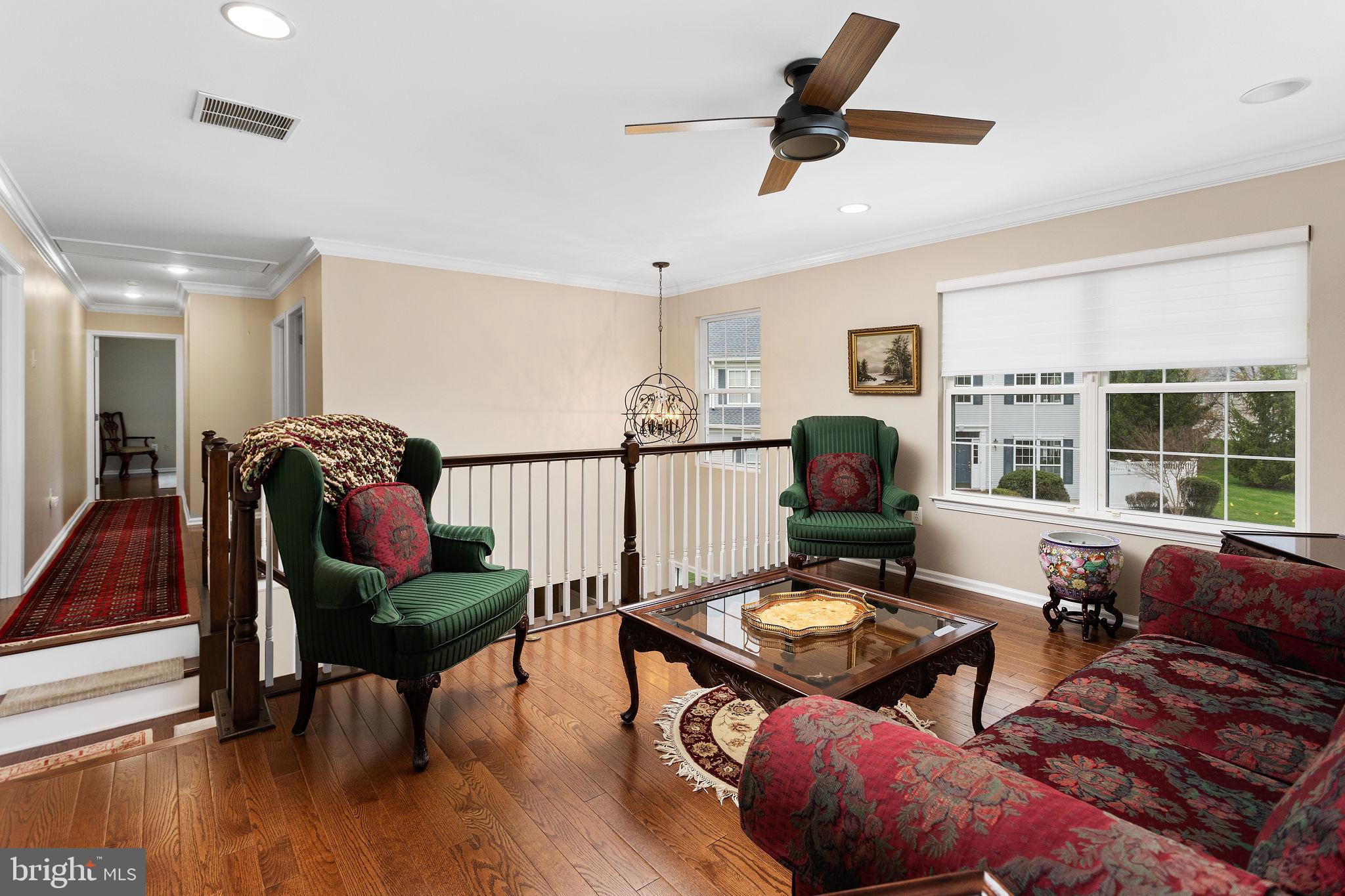 243 Colt Street Pennington, NJ 08534 - Photo 28 of 46 a living room with furniture and a window