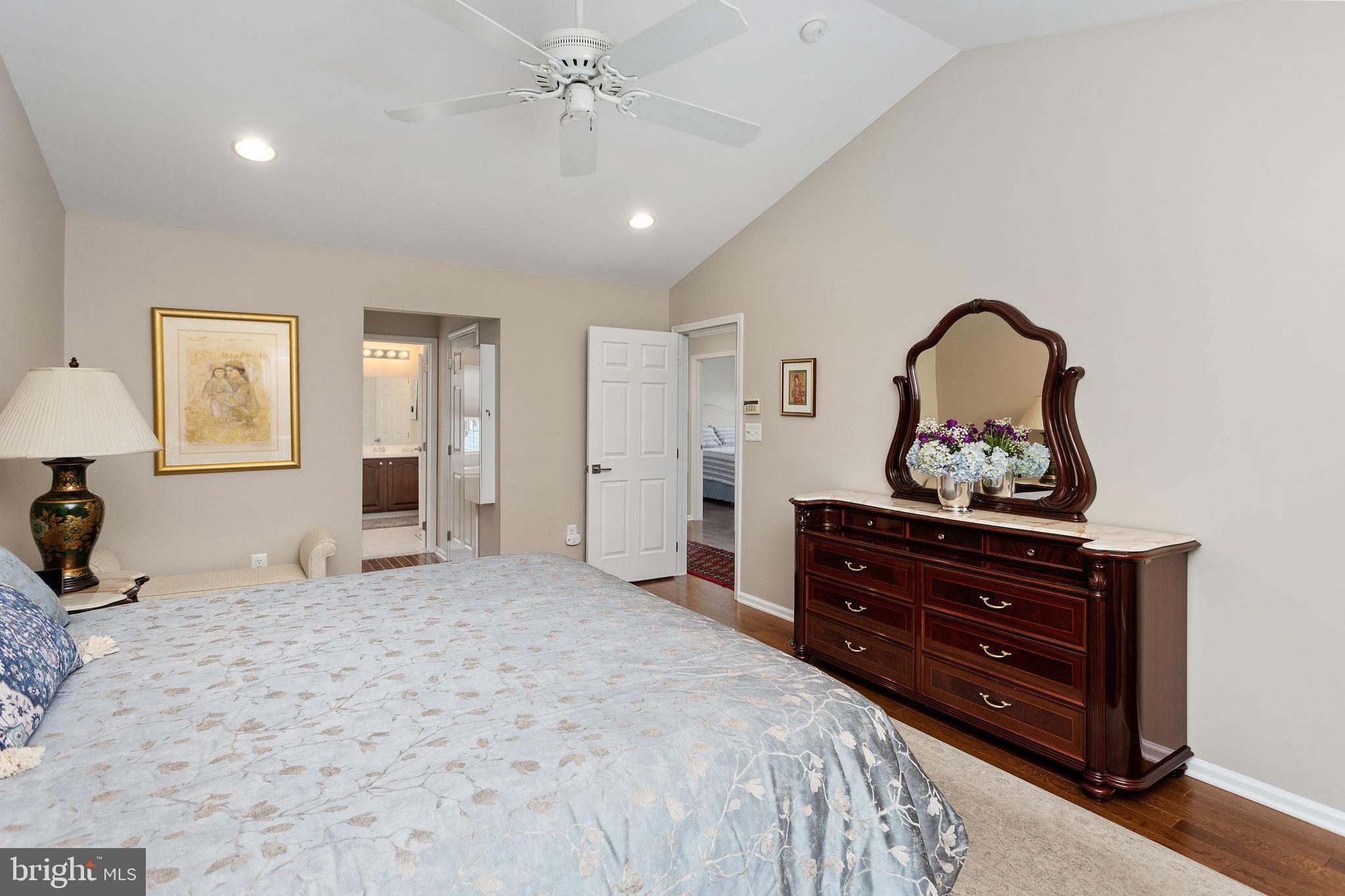 243 Colt Street Pennington, NJ 08534 - Photo 30 of 46 a bedroom with a bed and a dresser
