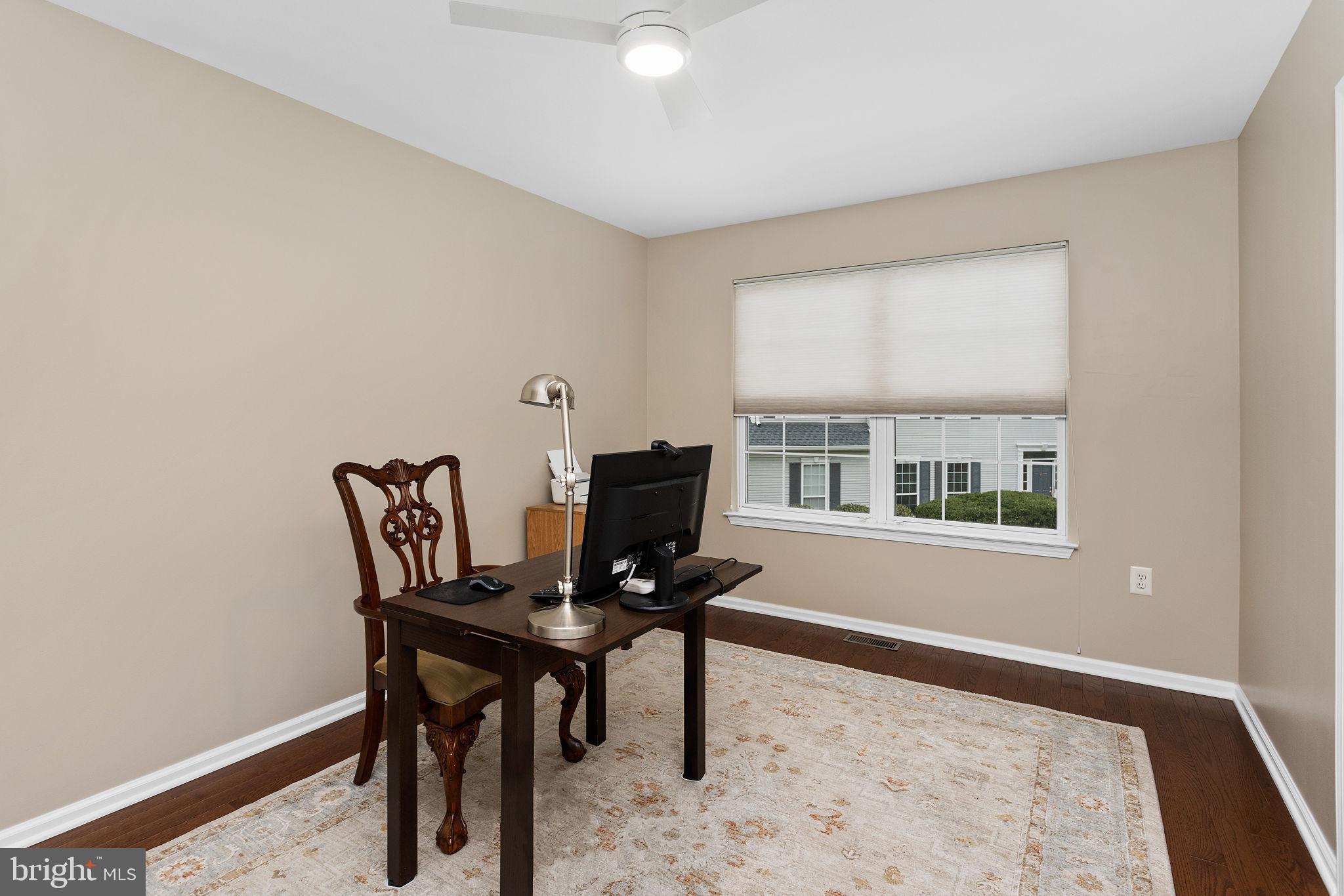 243 Colt Street Pennington, NJ 08534 - Photo 36 of 46 a workspace with furniture and a window