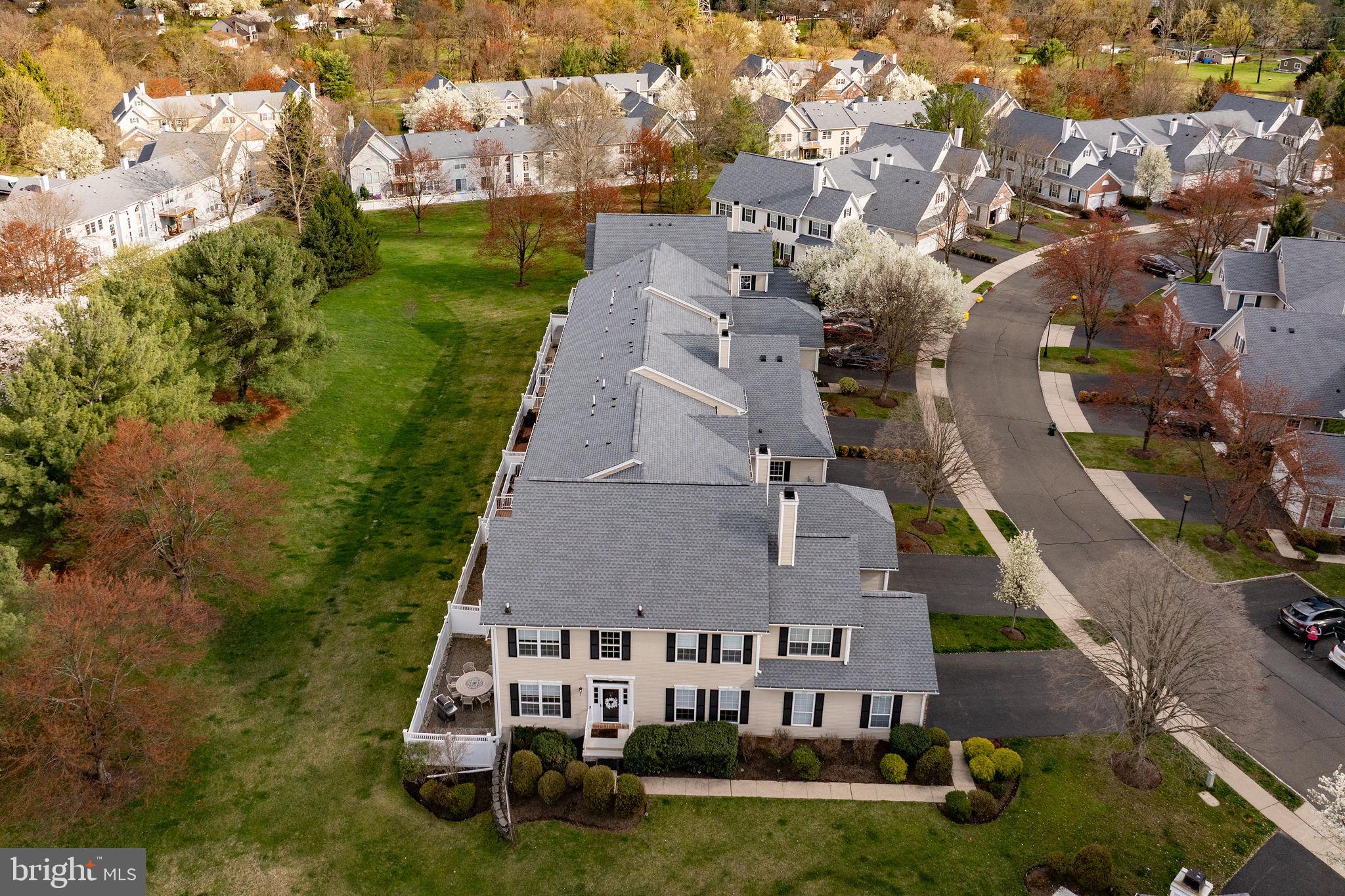 243 Colt Street Pennington, NJ 08534 - Photo 4 of 46 an aerial view of a house with a garden