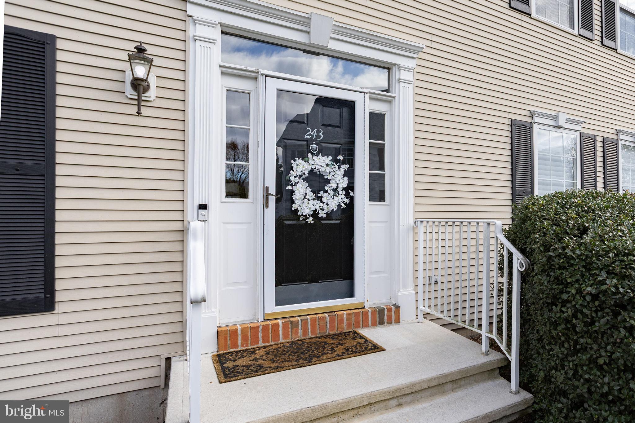 243 Colt Street Pennington, NJ 08534 - Photo 6 of 46 a view of a entryway front of house