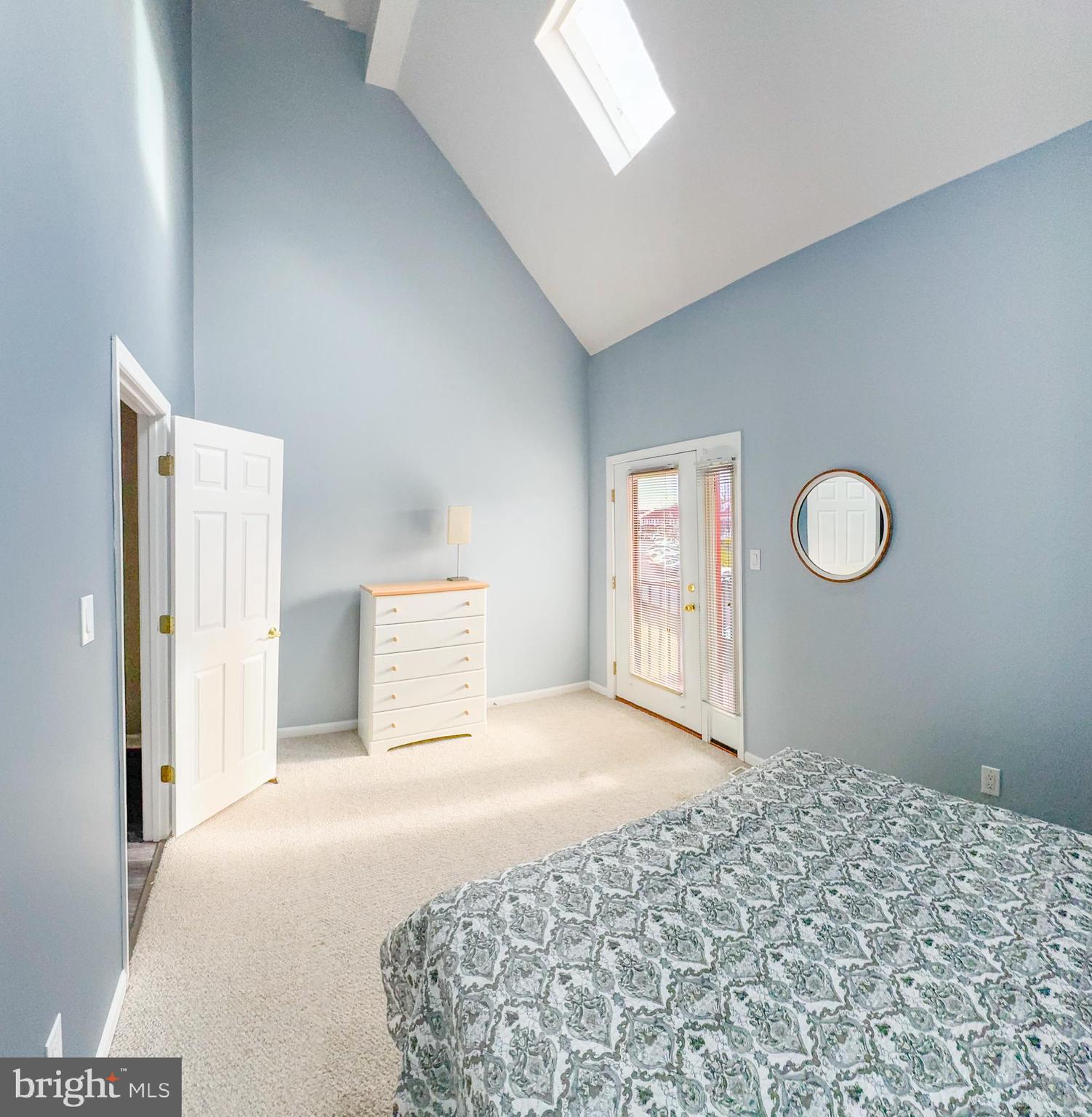 15 Queen Anne Way, Unit E Chester, MD 21619 - Photo 14 of 18 a bedroom with a bed and a window