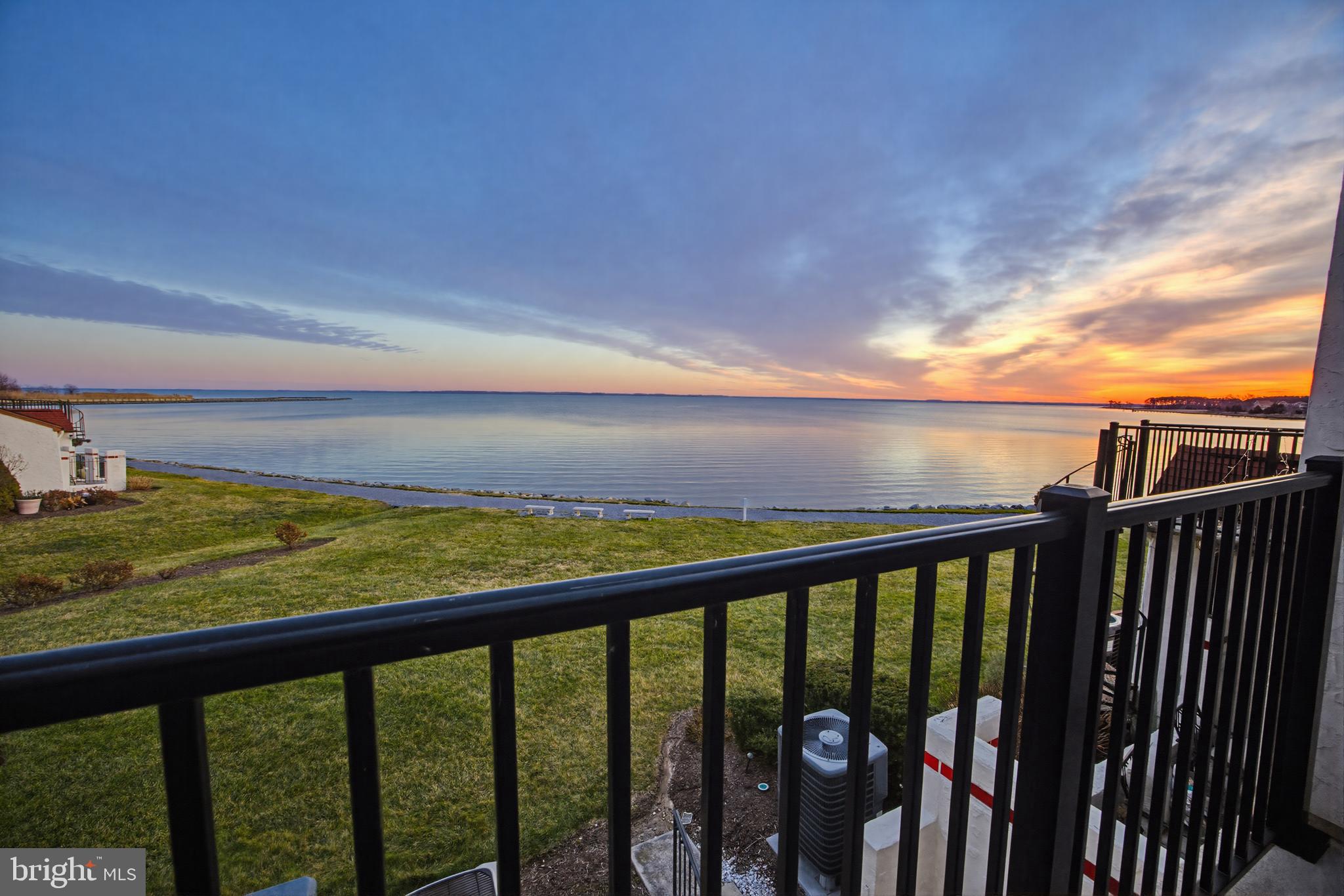 15 Queen Anne Way, Unit E Chester, MD 21619 - Photo 4 of 18 a view of ocean from a balcony