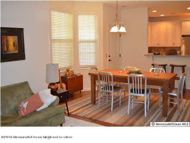 222 Bridge Avenue Red Bank, NJ 07701 - Photo 4 of 11 a dining room filled with furniture and a chandelier
