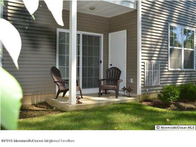 222 Bridge Avenue Red Bank, NJ 07701 - Photo 8 of 11 a backyard of a house with outdoor seating