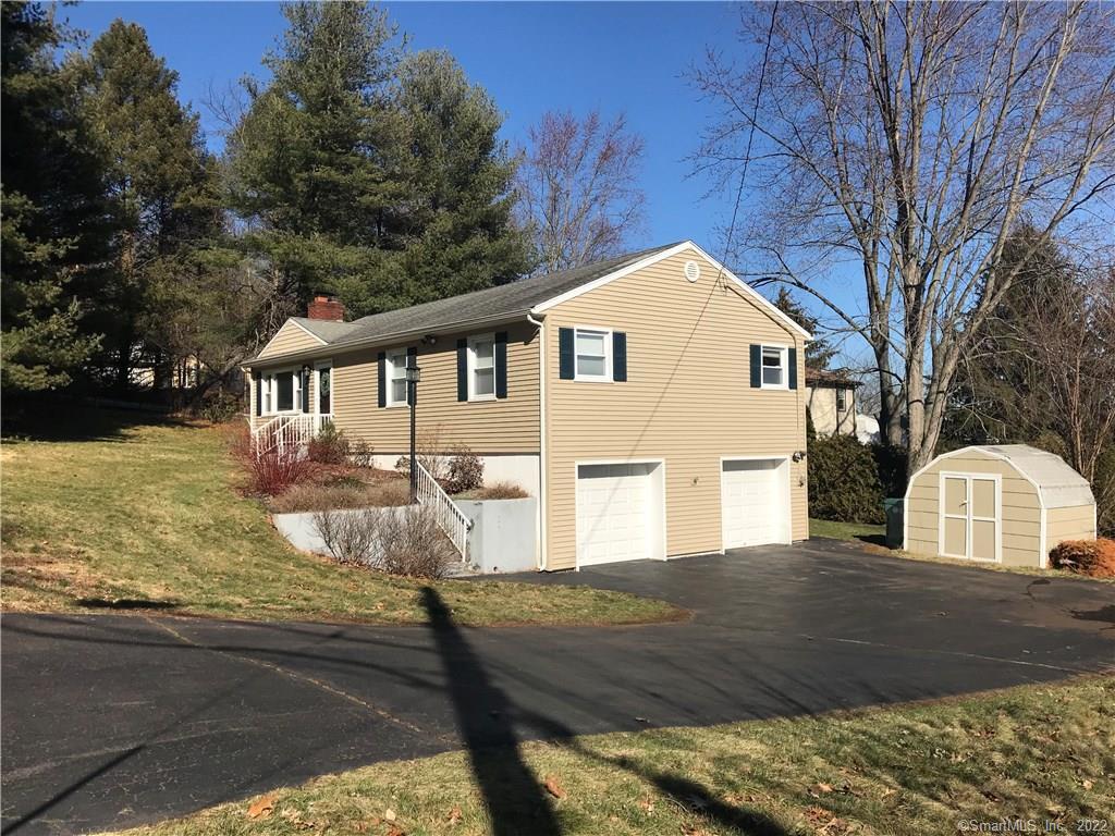 475 Dunbar Hill Road Hamden, CT 06514 - Photo 1 of 1 Exterior Side View - 2 Car Under Garage