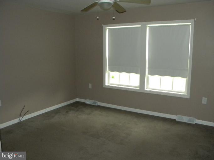 6125 Timber Ridge Road Berkeley Springs, WV 25411 - Photo 13 of 24 an empty room with a window