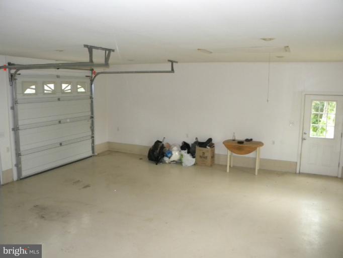 6125 Timber Ridge Road Berkeley Springs, WV 25411 - Photo 15 of 24 a view of a big room with toys and table