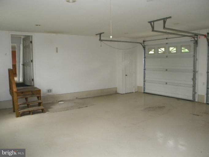 6125 Timber Ridge Road Berkeley Springs, WV 25411 - Photo 16 of 24 a view of a room with an empty space