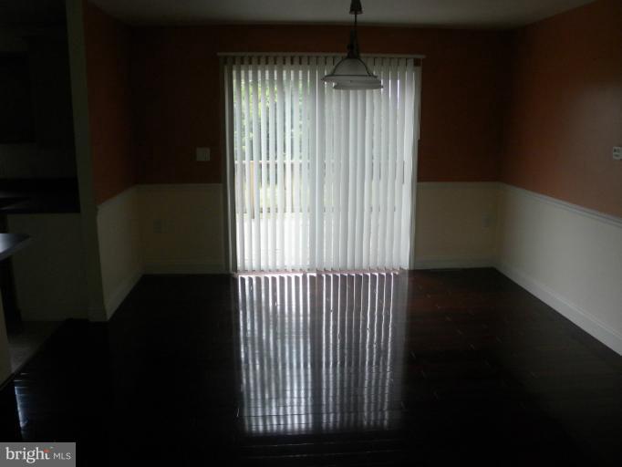 6125 Timber Ridge Road Berkeley Springs, WV 25411 - Photo 7 of 24 a view of a room has a window and wooden floor