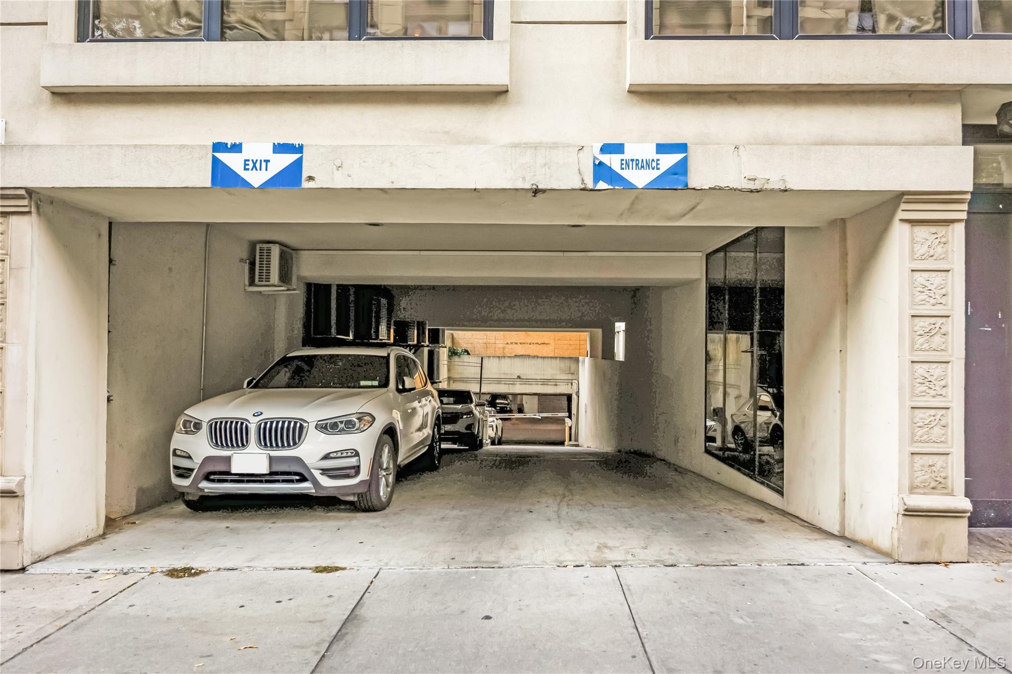 63-36 99th Street, Unit 4F Queens, NY 11374 - Photo 21 of 21 a car parked in front of a building
