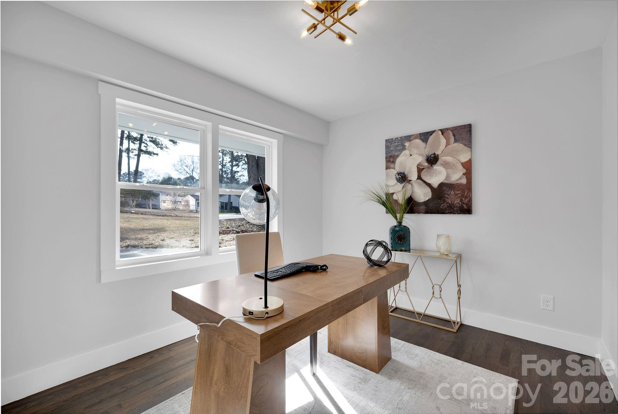 5413 Ruth Drive Charlotte, NC 28215 - Photo 11 of 29 a view of a workspace with furniture and a window