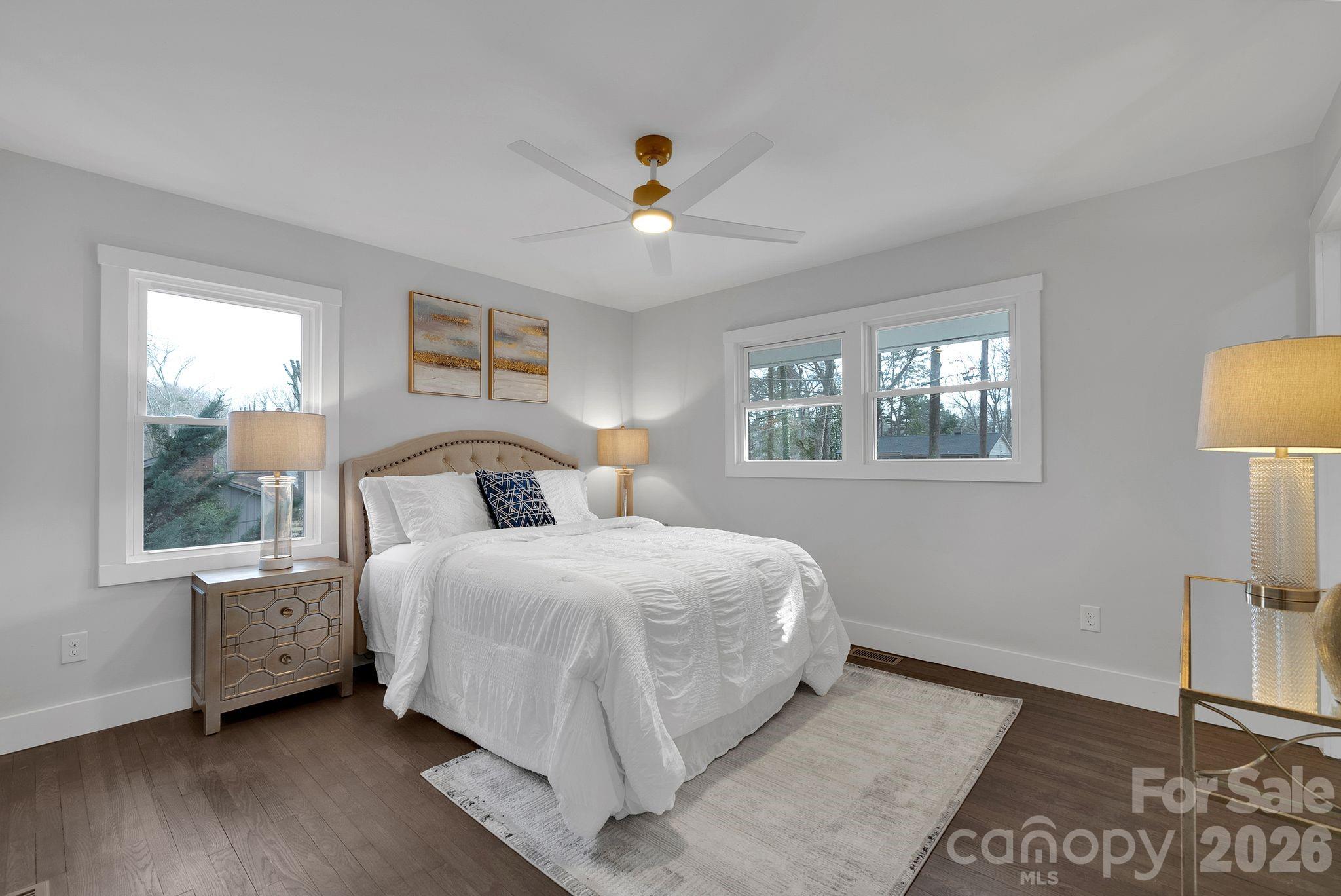 5413 Ruth Drive Charlotte, NC 28215 - Photo 14 of 29 a bedroom with a large bed and a window