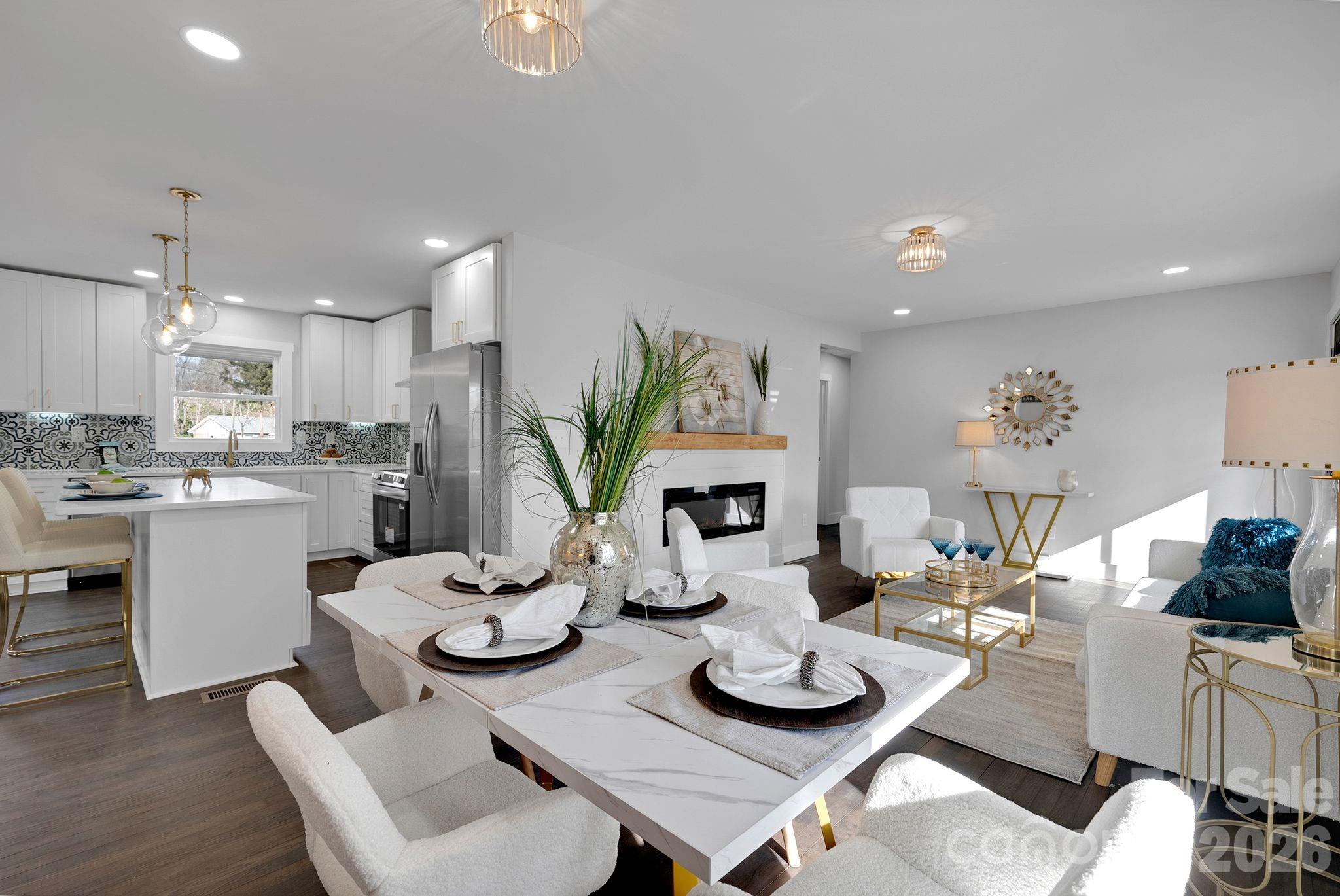 5413 Ruth Drive Charlotte, NC 28215 - Photo 5 of 29 a kitchen with furniture and a dining table