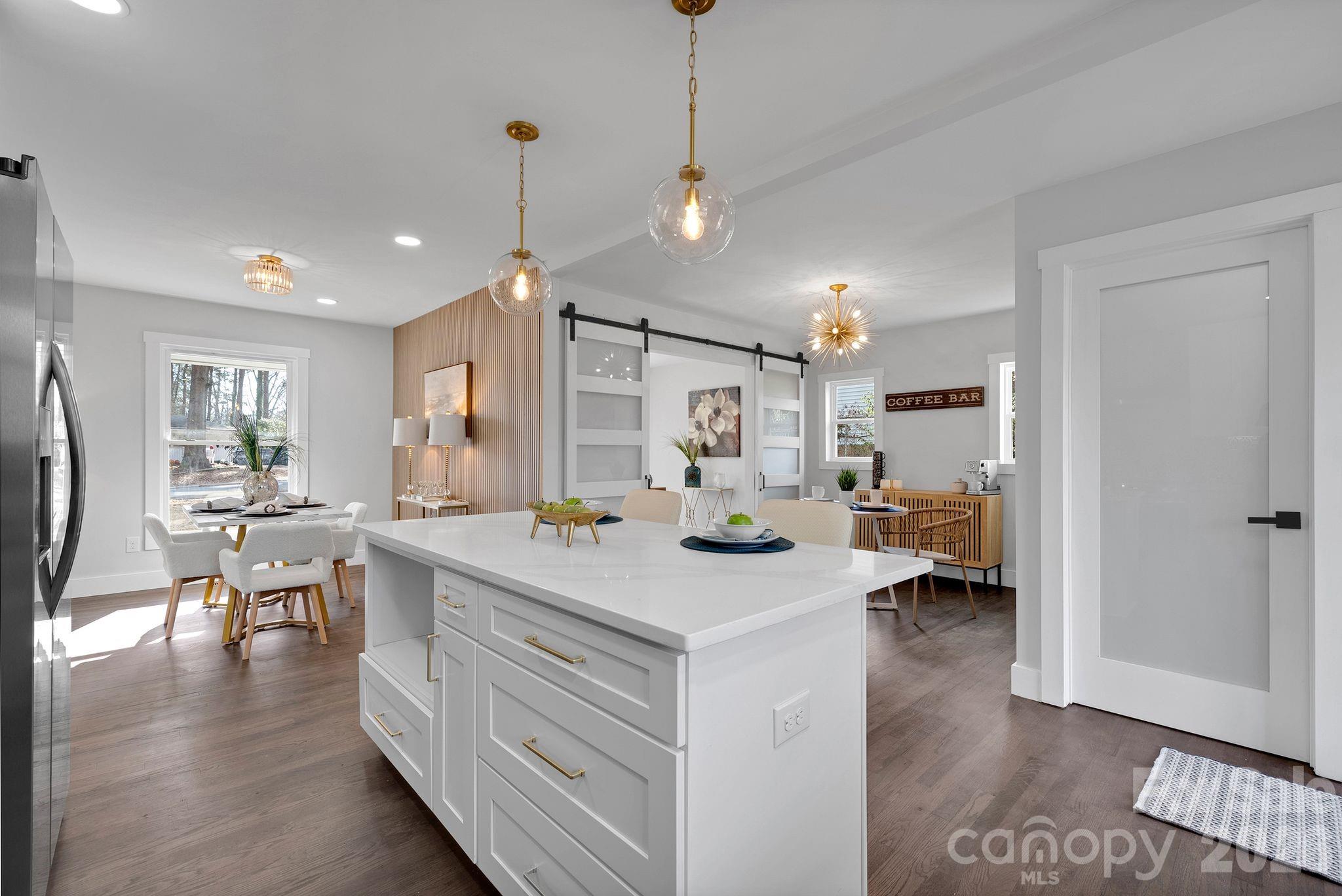 5413 Ruth Drive Charlotte, NC 28215 - Photo 8 of 29 a very nice looking dining room with a table and chairs