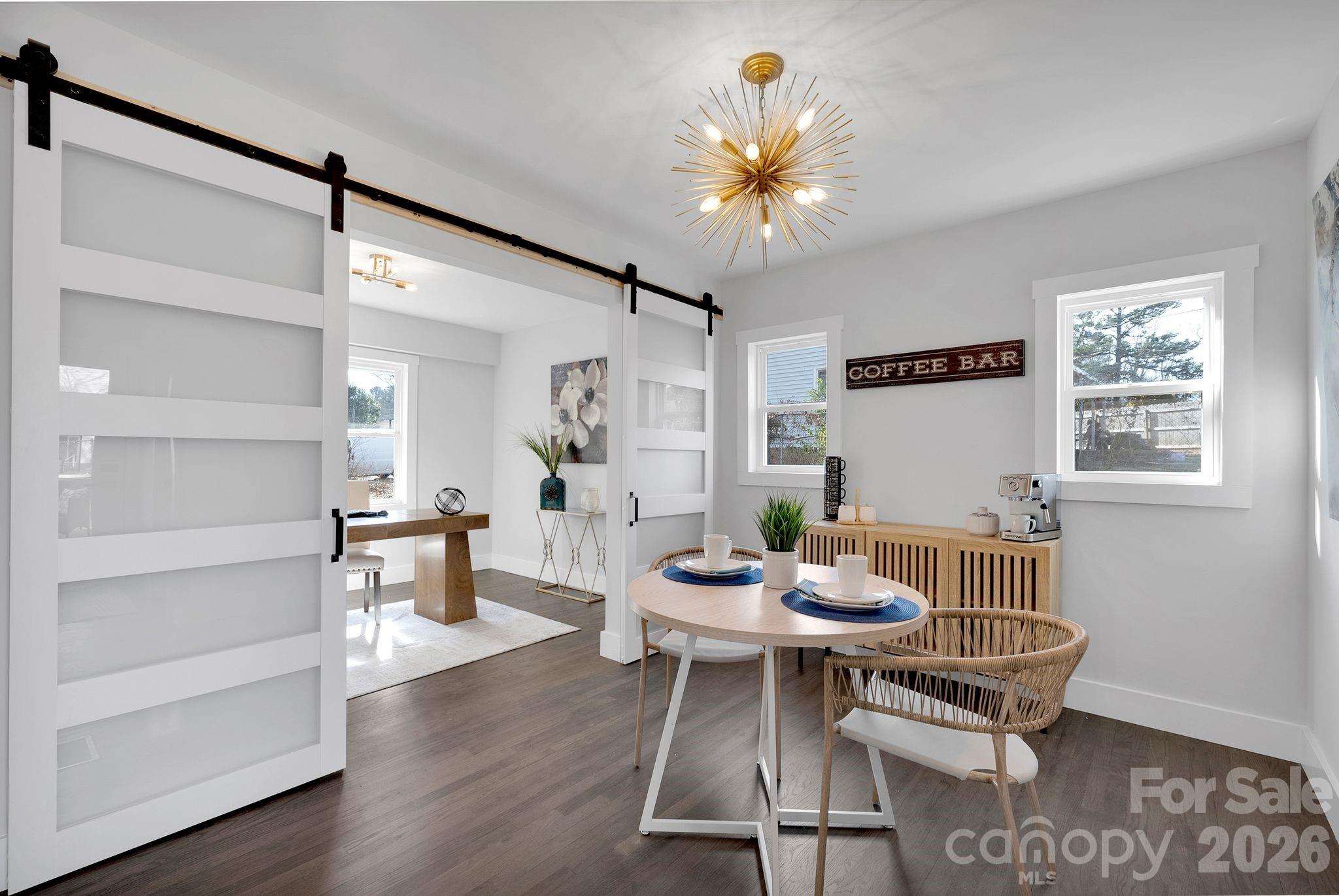 5413 Ruth Drive Charlotte, NC 28215 - Photo 9 of 29 a living room with furniture and a wooden floor