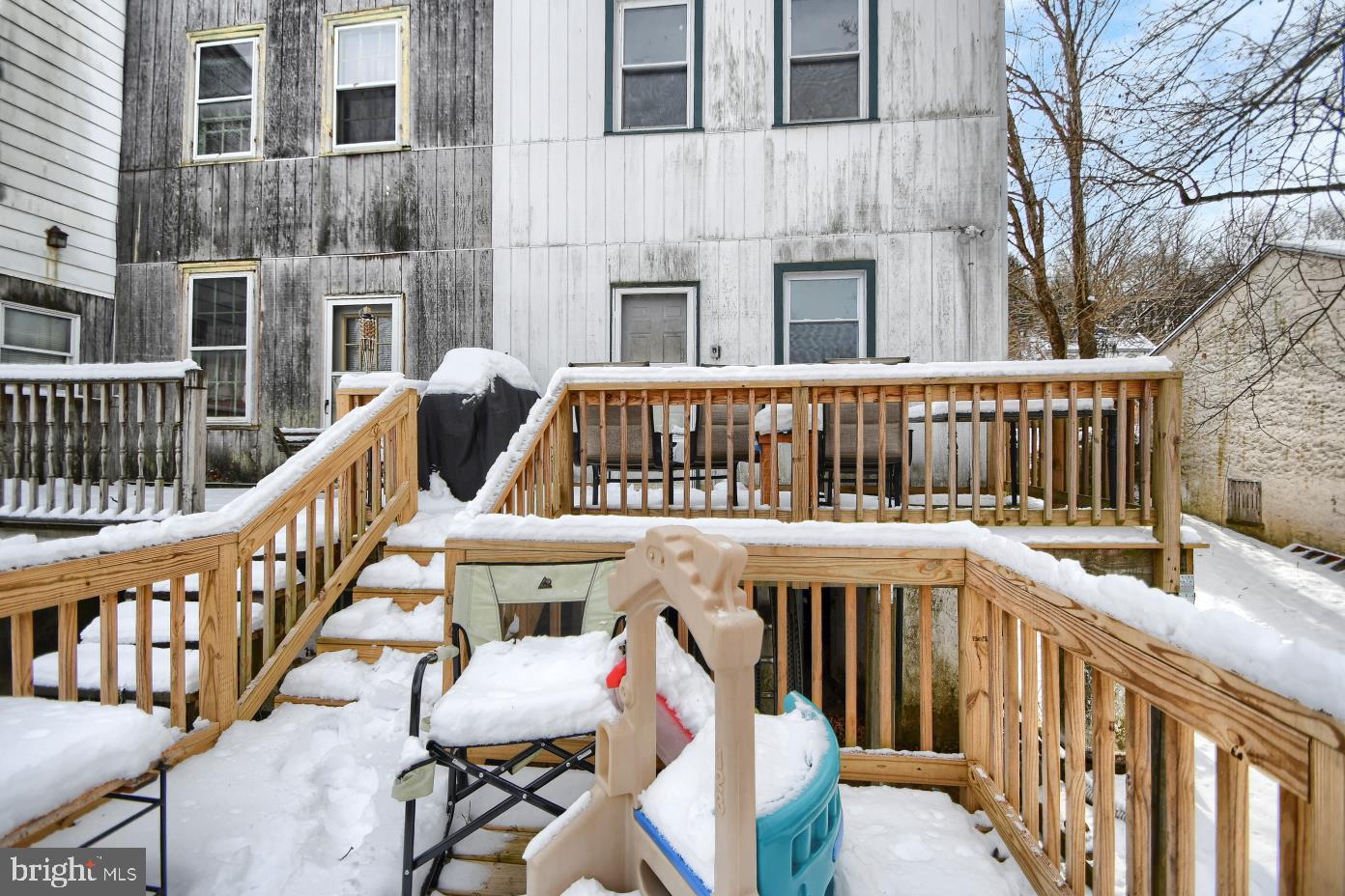 1251 Kimberton Road Chester Springs, PA 19425 - Photo 5 of 31 a view of a house with wooden deck stairs and furniture