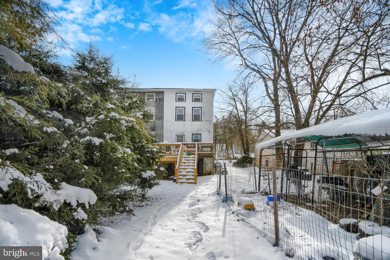 1251 Kimberton Road Chester Springs, PA 19425 - Photo 7 of 31 a front view of a house with a tree