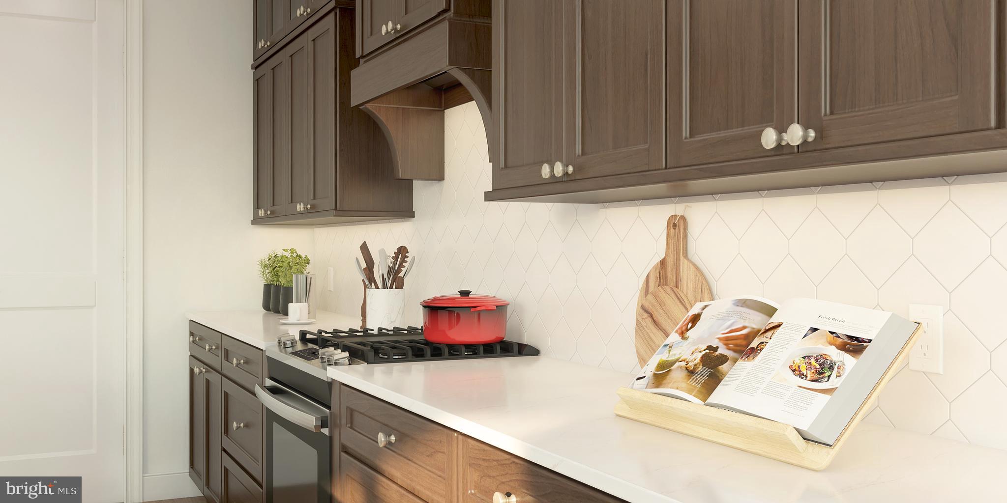 843 Merlin Drive Middletown, DE 19709 - Photo 8 of 16 a kitchen with stainless steel appliances granite countertop a sink dishwasher stove and cabinets